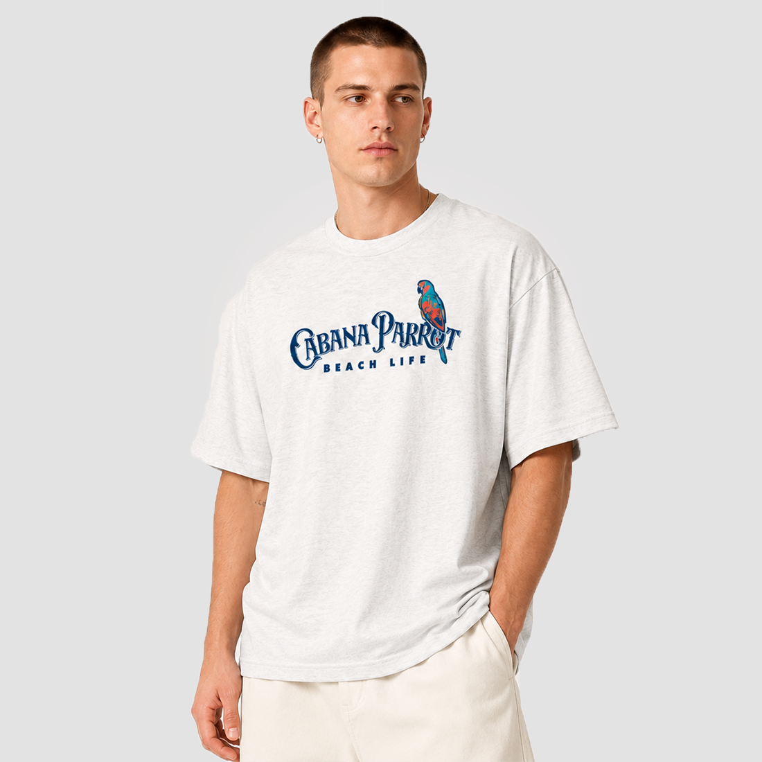 Men's Cabana Parrot beach life tee with colorful parrot graphic, soft unisex fit for summer style